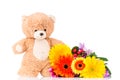 Flowers and teddy bear