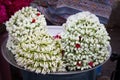 Flowers tied together and used as perfumed hair adornments