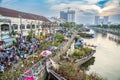 Flowers are transported by boat from the southwestern provinces to the Binh Dong wharf, Saigon River, to serve Saigonees this Tet