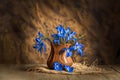 Flowers in a vase. Blue meadow flowers. Still life with flowers. Abstract dark background. AI generated Royalty Free Stock Photo