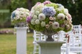 Flowers in the vase. Elegance set up for wedding ceremony Royalty Free Stock Photo