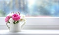 Flowers in vase on windowsill with empty copy space. Mother`s day decoration, valentine`s day card.Birthday present. 8 march