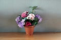 A flowers in a vase on a wooden table in the cafe, decoration concept