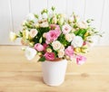 Flowers for women`s day. Mother`s day greeting card. Bouquet of flowers eustoma and roses in vase. Happy Birthday! Valentine`s Royalty Free Stock Photo