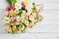Flowers for women`s day. Mother`s day greeting card. Bouquet of flowers eustoma and roses in vase. Happy Birthday! Valentine`s Royalty Free Stock Photo