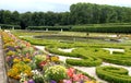 Flowery park, planted with trees, with water tanks of Bruhl castle in Germany