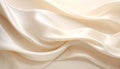 Flowing beige fabric with soft light creating a smooth, abstract background texture Royalty Free Stock Photo