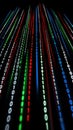 Flowing binary code streams in vibrant colors on black Royalty Free Stock Photo