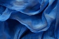 Flowing blue fabric texture