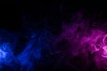 Flowing clouds of colorful swirling blue and purple neon smoke