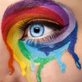 Flowing colors on an eye in fashion stage make up Royalty Free Stock Photo