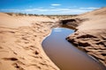 a flowing desert spring trickling through the sandy landscape