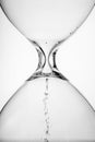 Flowing hourglass in white background