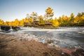 Flowing Kettle River in Banning State Park in Minnesota during the fall. Long exposure Royalty Free Stock Photo