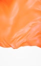Flowing orange cloth background, 3d rendering