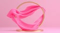 Flowing Pink Fabric in Circular Gold Frame on Soft Pink Background Royalty Free Stock Photo