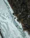 Flowing river at winter. Winter landscape with a River and Winter Forest. aerial view from icy river in winter Royalty Free Stock Photo