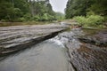 Flowing rocky creek clear clean water