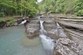 Flowing rocky creek clear clean water