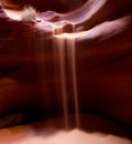 Flowing sand in Upper Antelope Canyon, Northern Arizona Royalty Free Stock Photo