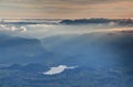 Sea of clouds, mist and sun rays at sunset, Lake Bled, Slovenia