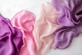Flowing silk fabrics in soft tones create an elegant display with ample blank space for additional text or graphics Royalty Free Stock Photo