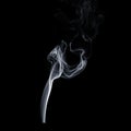 Flowing smoke on black background, white vapor, abstract flow of cigarette smoke, aroma stick smoke Royalty Free Stock Photo