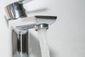 Flowing water from bath faucet