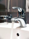 Flowing water faucet Royalty Free Stock Photo