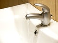 Flowing water faucet Royalty Free Stock Photo