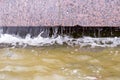 Flowing water in the fountain. decorative, natural. Royalty Free Stock Photo