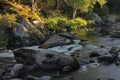 Flowing water over rocks and boulders Royalty Free Stock Photo