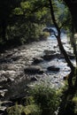 Flowing water over rocks and boulders Royalty Free Stock Photo