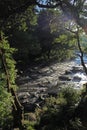 Flowing water over rocks and boulders Royalty Free Stock Photo