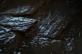 Flowing water over rocks in Lisbon oceanarium aquarium Royalty Free Stock Photo