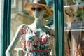 flowy summer dress on mannequin with hat and sunglasses Royalty Free Stock Photo