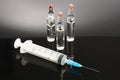 Flu ampules and syringe Royalty Free Stock Photo