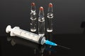 Flu ampules and syringe Royalty Free Stock Photo