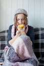 Flu cold grippe. Woman having high temperature. Sick girl with fever checking mercury thermometer Royalty Free Stock Photo