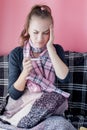 Flu cold grippe. Woman having high temperature. Sick girl with fever checking mercury thermometer on pink background Royalty Free Stock Photo