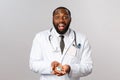 Flu, disease, healthcare and medicine concept. Excited cheerful african-american doctor look amazed, sharing great news