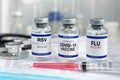 Flu, RSV and Sars-cov-2 Coronavirus vaccine vials in the medical clinic