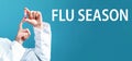 Flu Season theme with a doctor holding a laboratory vial Royalty Free Stock Photo