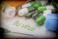 Flu virus, medicines and syringes as concept of ordinary treatment health