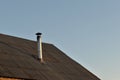 Flue chimney to the roof of the house.