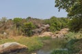 fluent river with rocks and vegetation in Africa. Lubango. Angola.