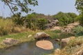 fluent river with rocks and vegetation in Africa. Lubango. Angola.