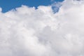 Eye level view of billowing white clouds with blue sky behind Royalty Free Stock Photo