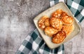 Fluffy buttermilk pancakes on a square plate on a dark background Royalty Free Stock Photo