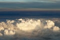 Fluffy clouds over the earth, the landscape.